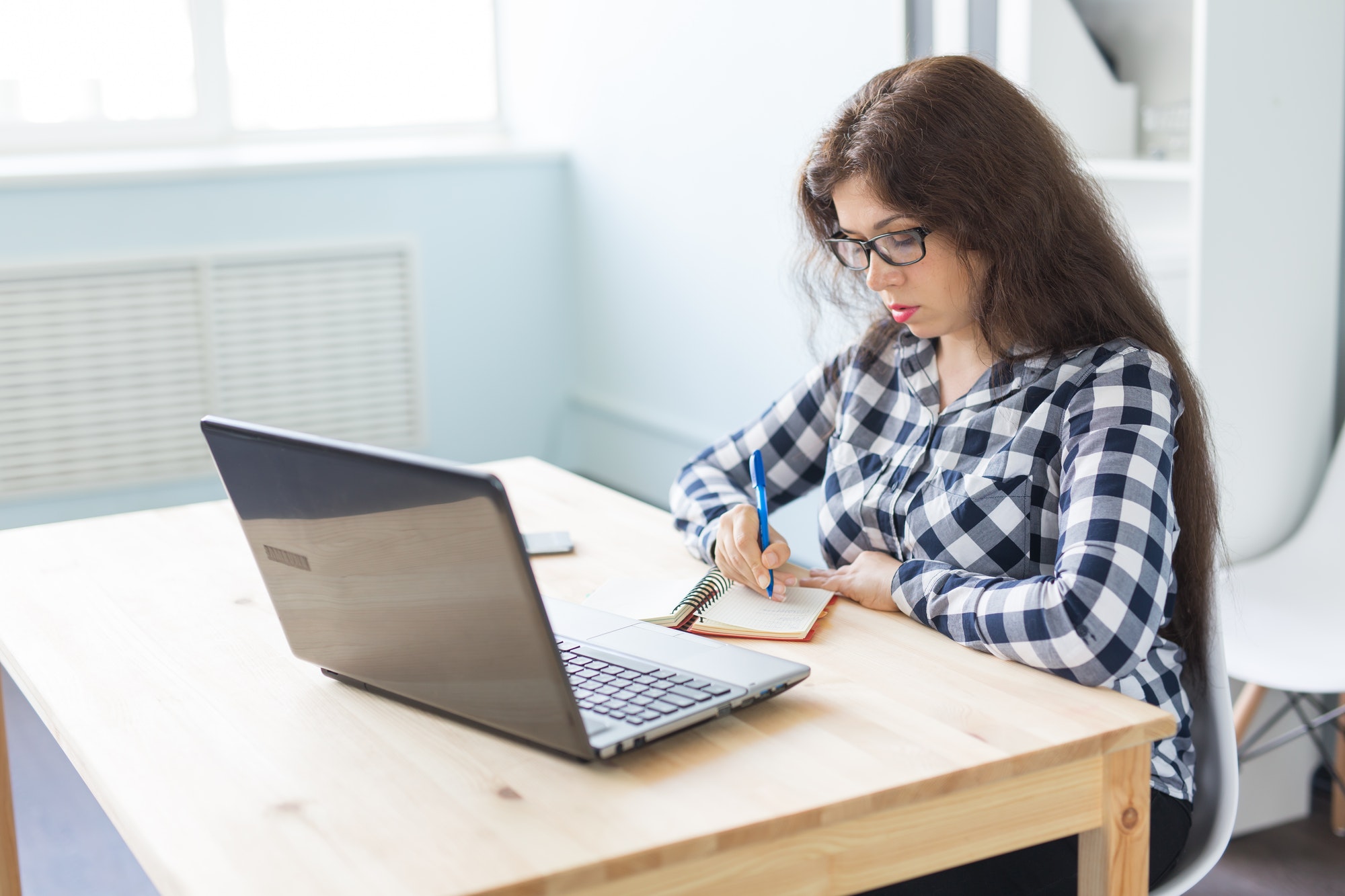 office-and-business-people-concept-woman-is-working-at-the-office-with-laptop.jpg